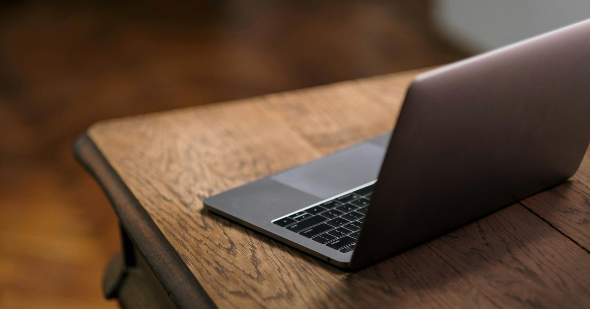Laptop on a wooden desk